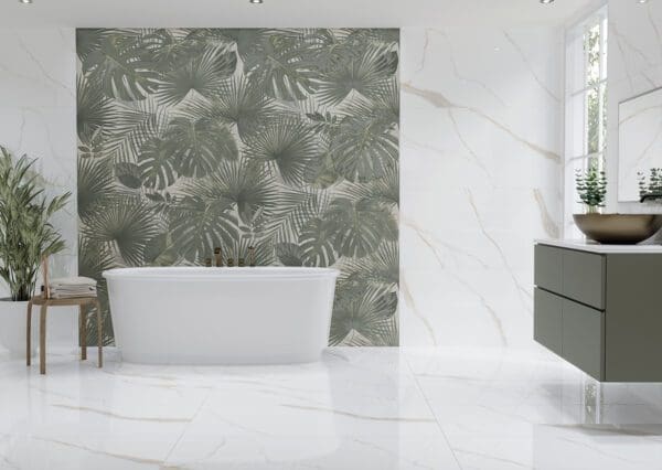 A bathroom with a palm tree wallpaper.