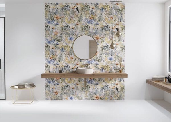 A bathroom with a colorful floral wallpaper.