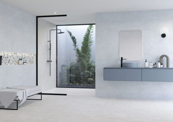 a beautiful bathroom with a bench and mirror