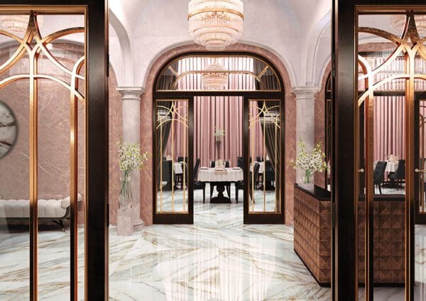 Entrance of a hotel with marble flooring in light color